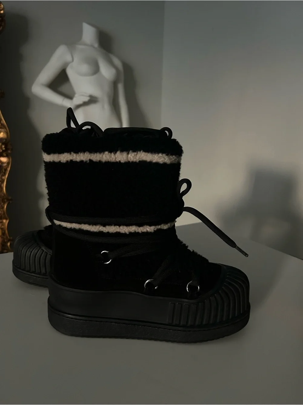 Louis Vuitton Black Knit-Trim Winter Boots with Monogram Detail.
